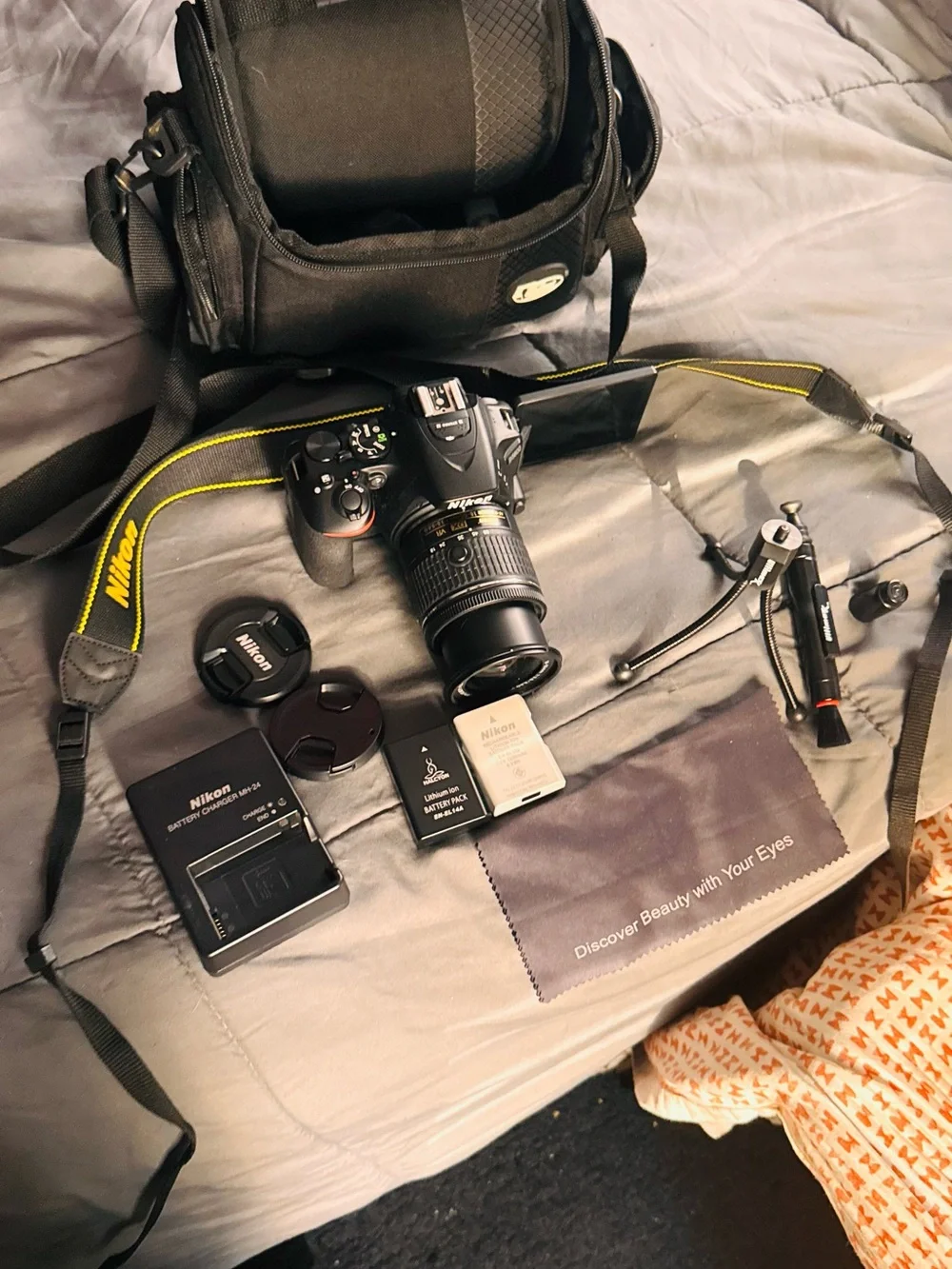 Nikon DSLR Camera Kit in Black with Yellow-Trim Strap